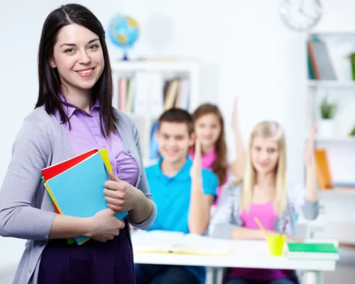 happy-teacher-with-students-background_1098-2917